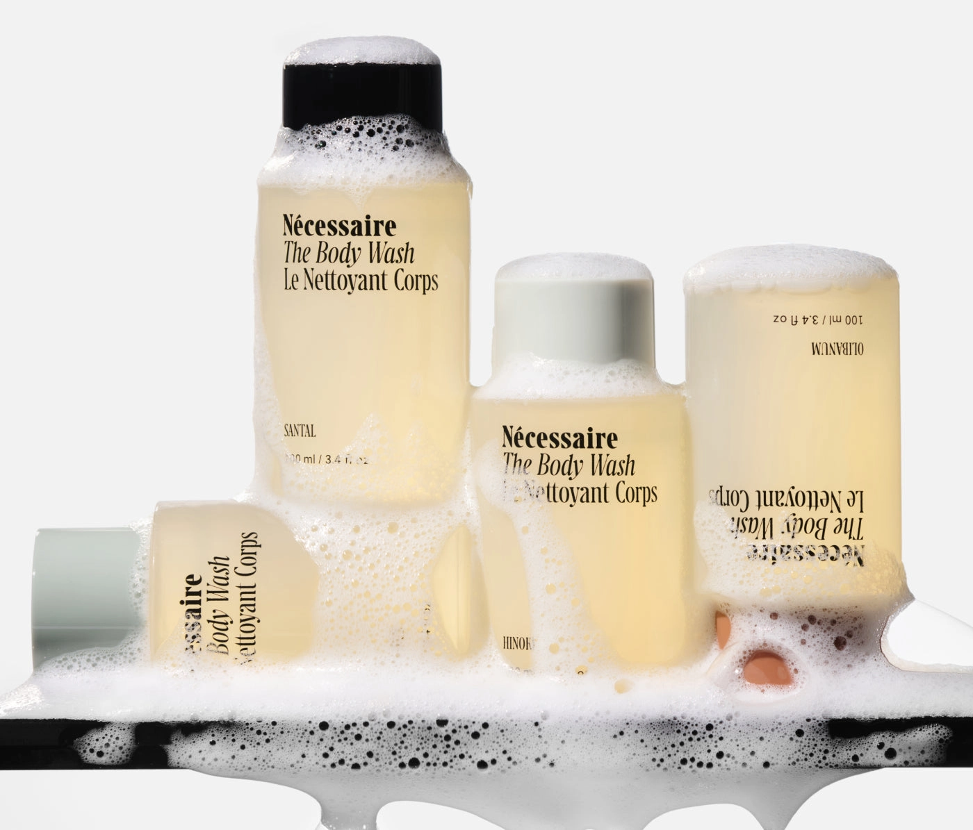 Small Body Wash bottles in several scents, covered in foam
